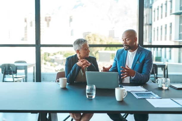 A professional working session focused on business analysis.